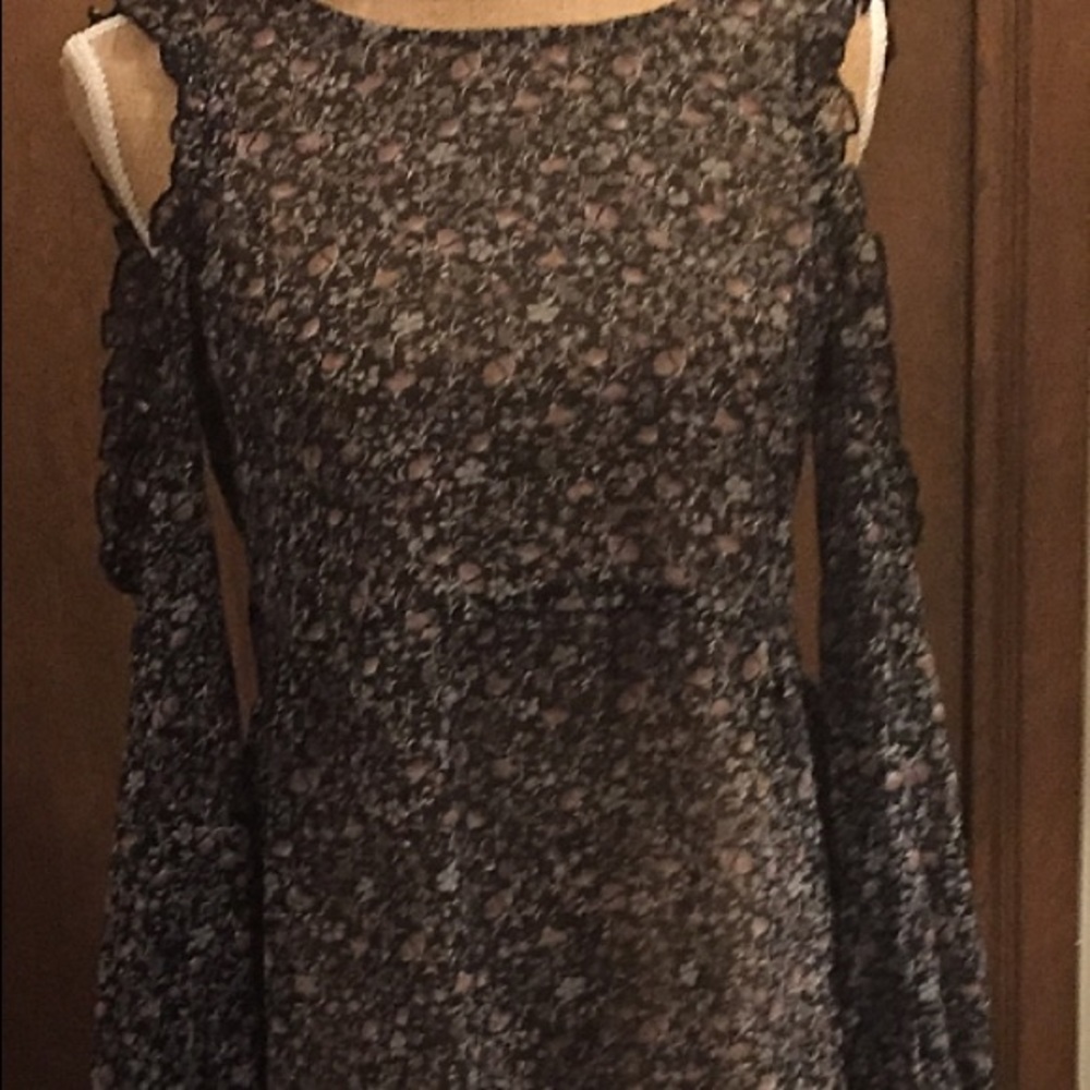 Floral long sleeve, cold shoulder blouse.